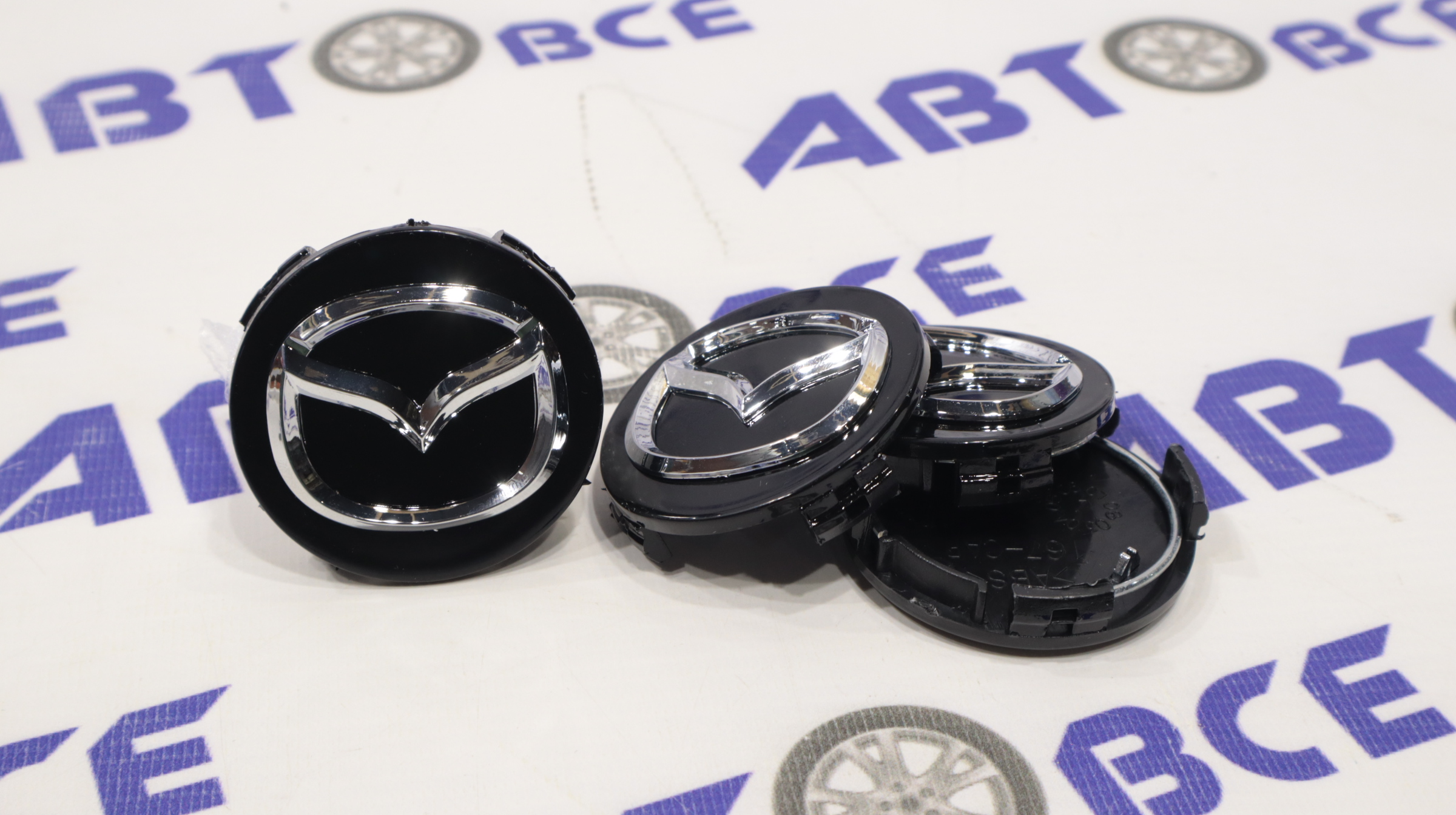 Колпачок ступицы (пластик) комплект 4шт MAZDA черный хром (57мм)